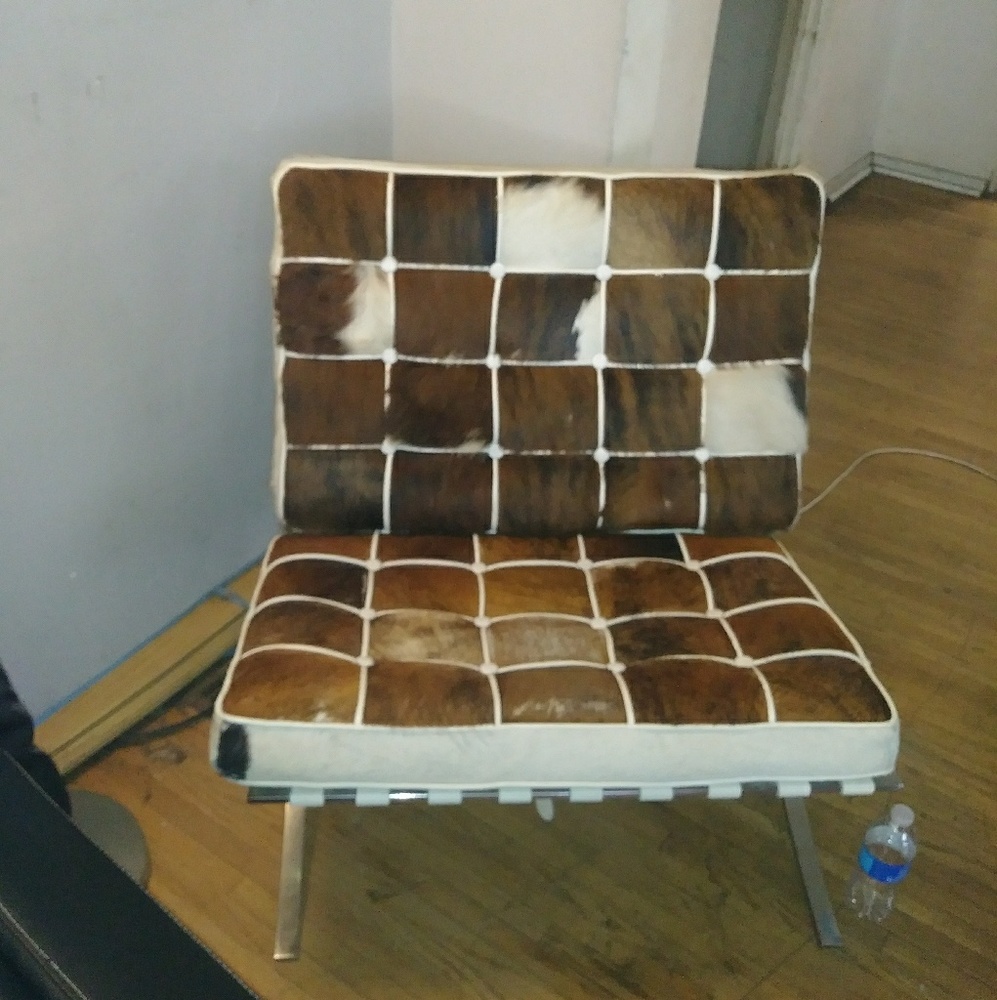 Vintage barca. Cowhide slipper chair